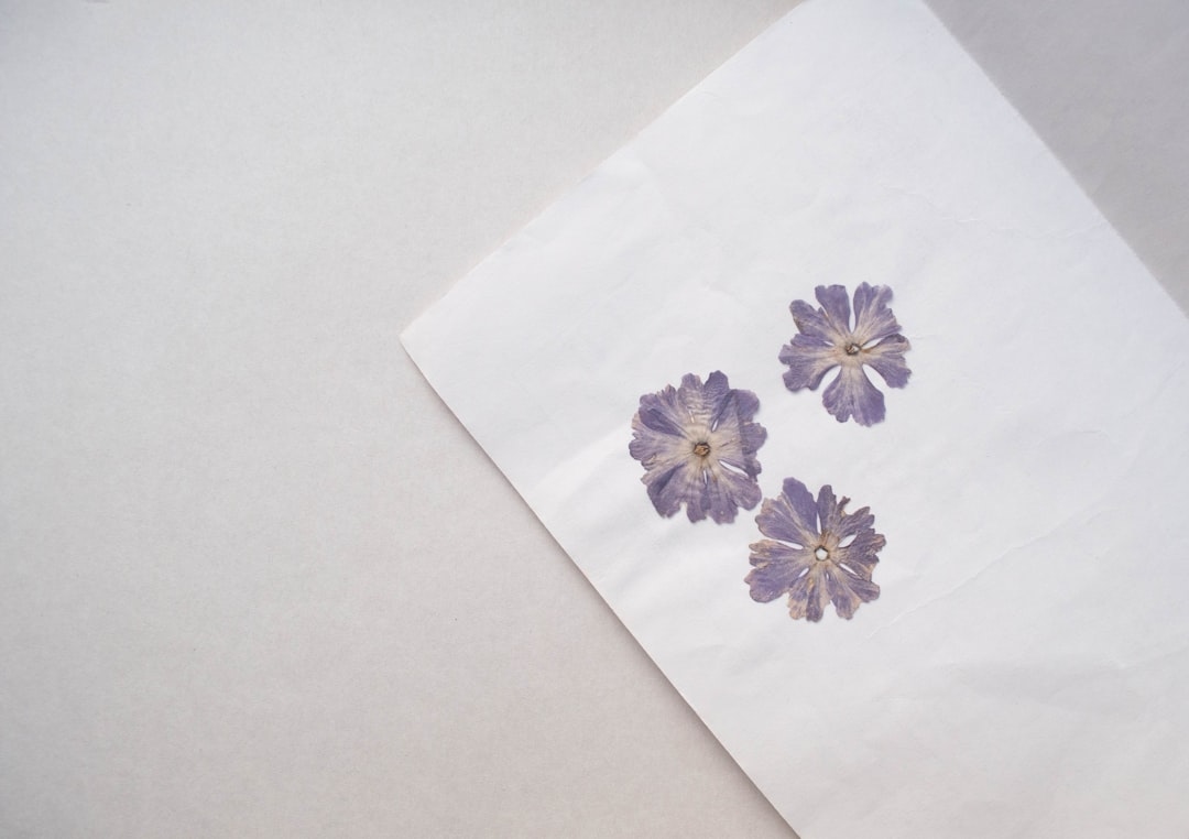 Ironing flowers to press them – tutorial